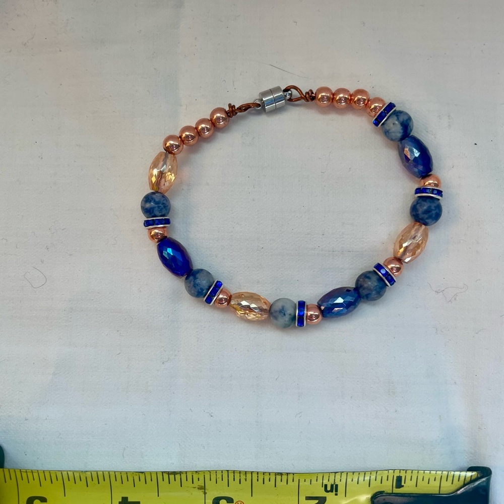 Elegant Blue and Copper Beaded Bracelet with magnetic clasp.
